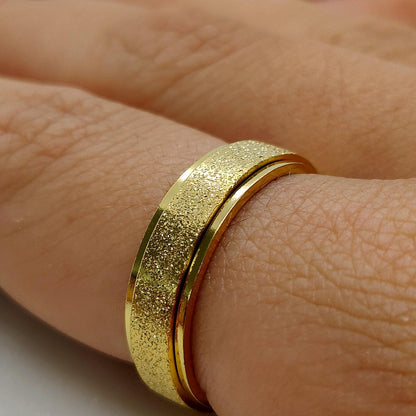 Anxiety ring (Glitter) Goud om vinger